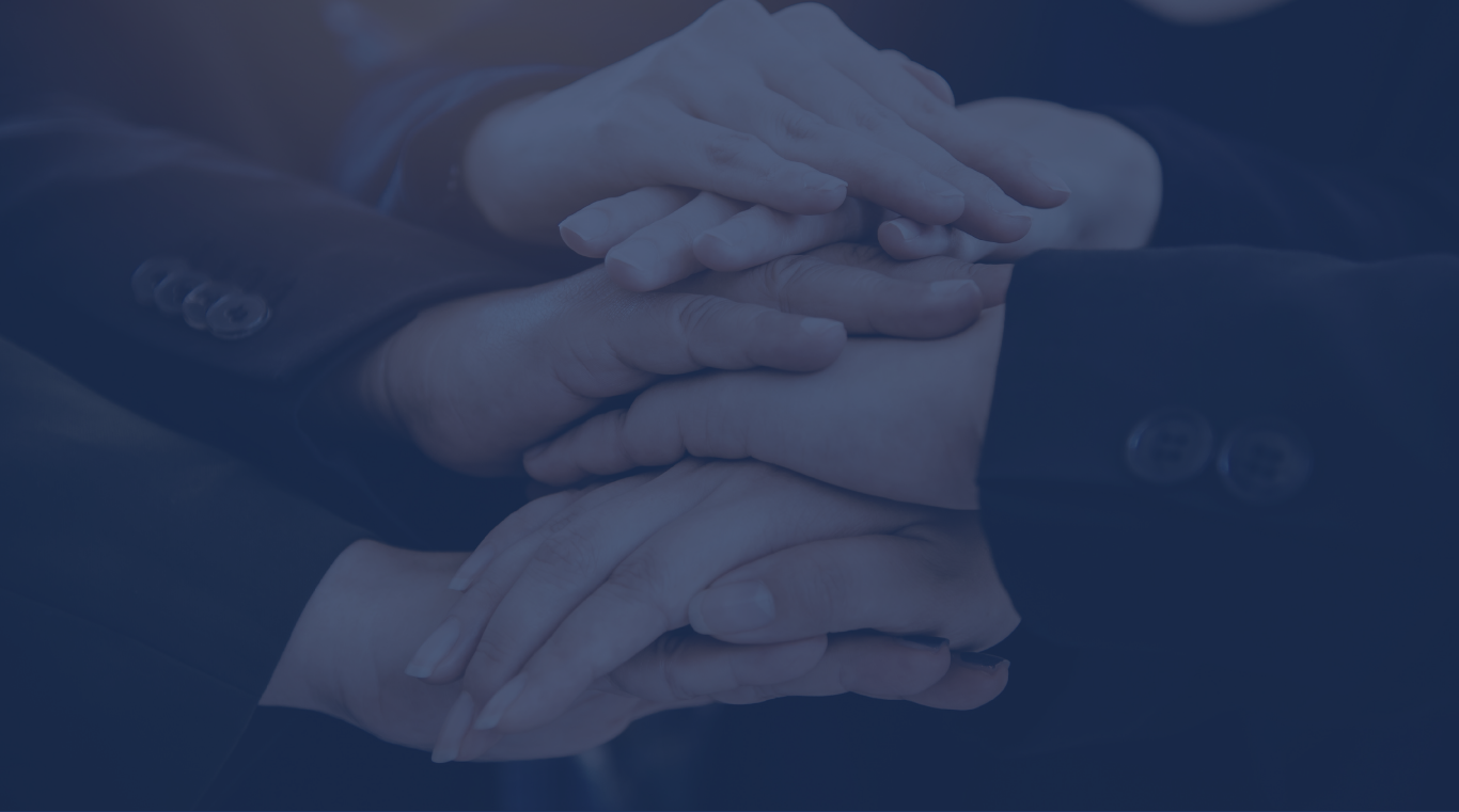Hands joined together to represent institutional partnership